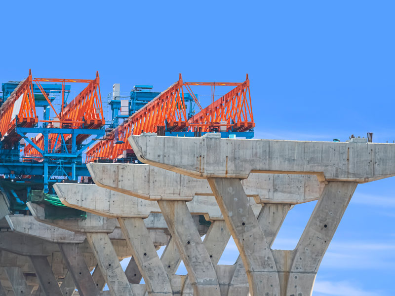 bridge building as part of highway construction companies' jobs