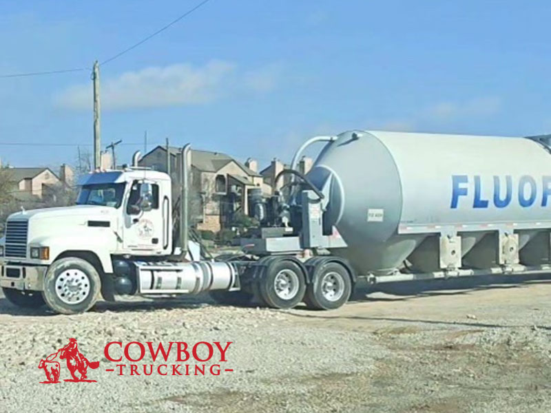 A Cowboy Trucking tractor pulling a client's trailer to illustrate power-only from a trucking service Dallas