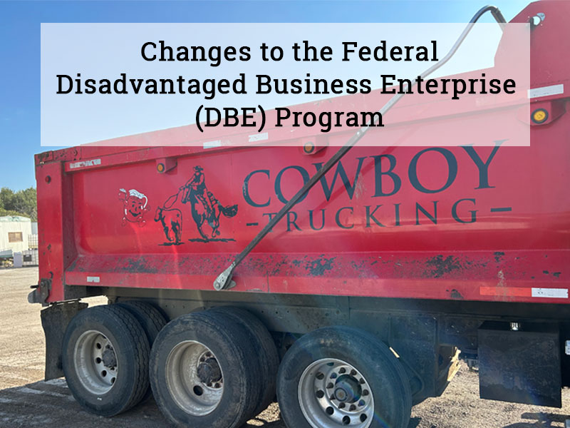 A Cowboy Trucking truck with the title of the article superimposed: Changes to the Federal Disadvantaged Business Enterprise Program (DBE) October 2025